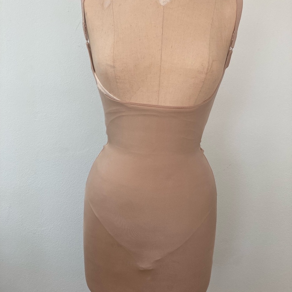 Spanx compression bodysuit with skirt. Size S